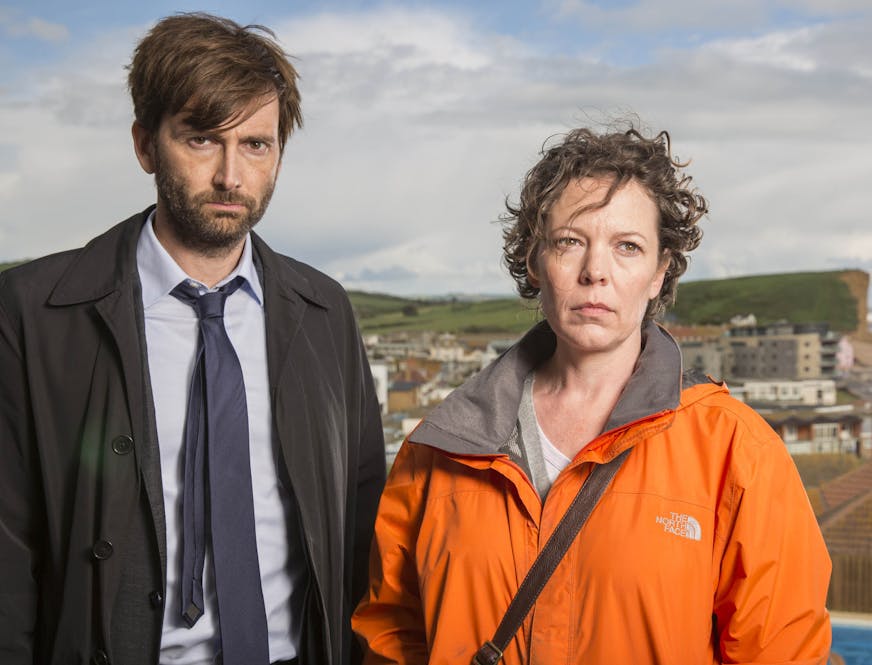 OLIVIA COLMAN (Ellie Miller) and DAVID TENNANT (Alec Hardy) on "Broadchurch" Photo Credit: Patrick Redmond , BBC