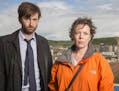 OLIVIA COLMAN (Ellie Miller) and DAVID TENNANT (Alec Hardy) on "Broadchurch" Photo Credit: Patrick Redmond , BBC