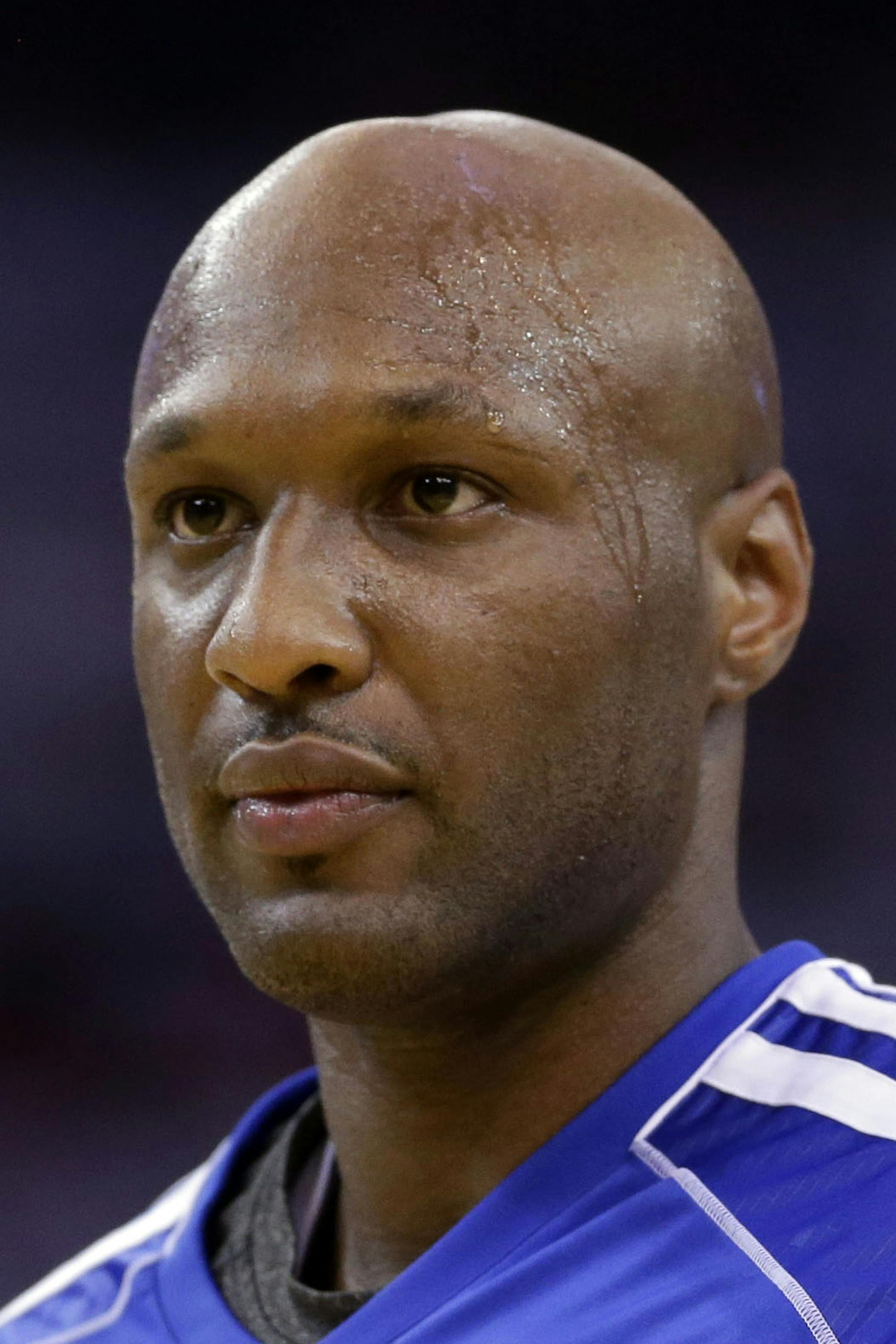 FILE - This Jan. 2, 2013 file photo shows Los Angeles Clippers' Lamar Odom (7) in action against the Golden State Warriors during an NBA basketball game in Oakland, Calif. Authorities say former NBA and reality TV star Odom has been hospitalized after he was found unconscious at a Nevada brothel. Nye County Sheriff Sharon A. Wehrly says the department got a call Tuesday afternoon, Oct. 13, 2015, requesting an ambulance for an unresponsive man at the Love Ranch in Crystal, Nevada about 70 miles o