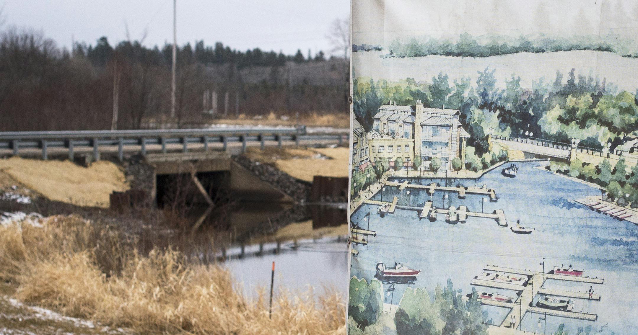 A Harbor Renaissance Project banner is set up on display alongside Highway 169 and the harbor to illustrate what many Tower residents hope is the future harbor of the town. ] (Aaron Lavinsky | StarTribune) aaron.lavinsky@startribune.com The Iron Range town of Tower, Minn., has moved two highways, dredged out a harbor and invited investors to help them remake its downtown, all in the name of fishing and tourism. It's cost $7 million already -- a huge expense for the town of 500 people -- but the