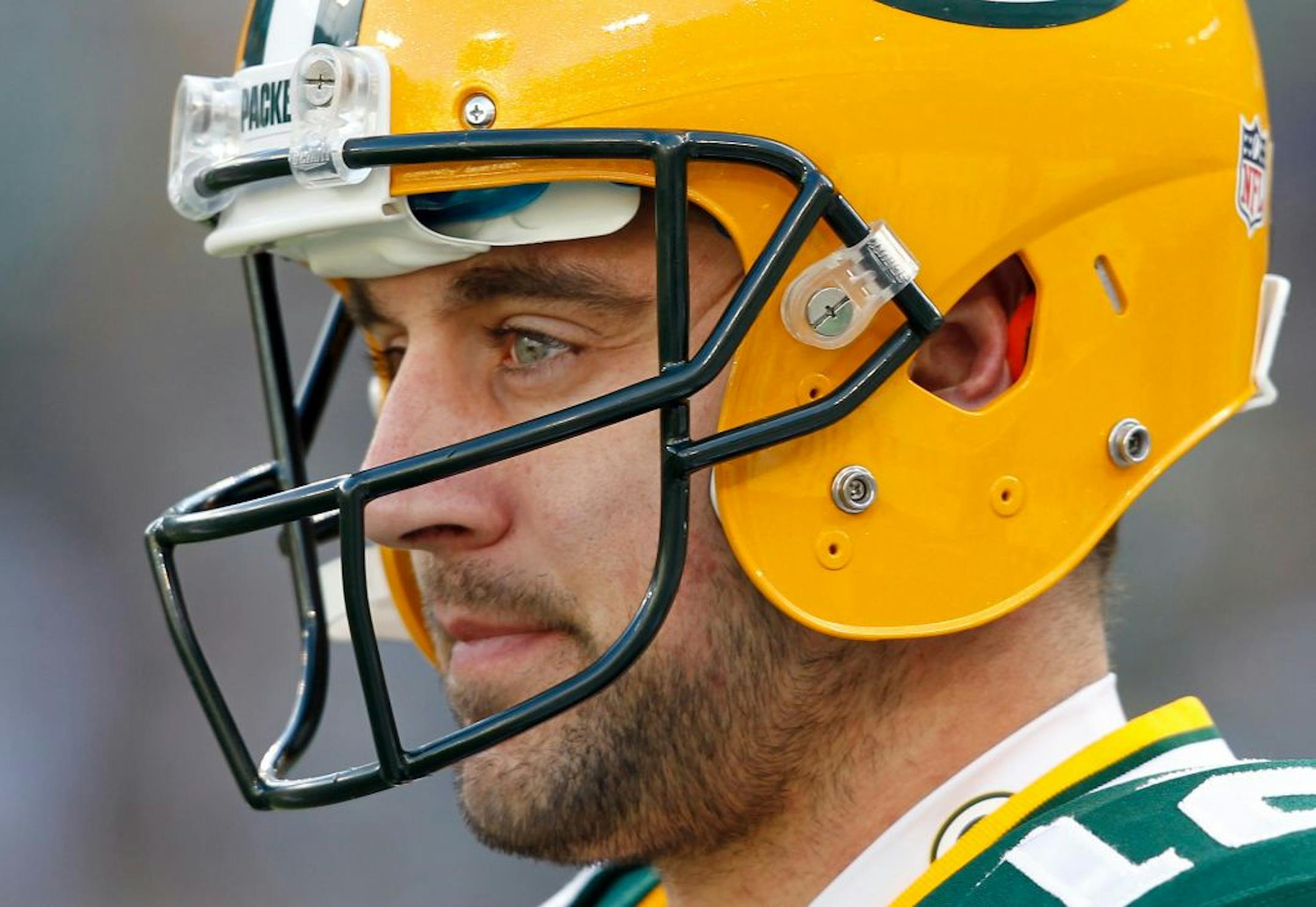 Green Bay Packers' Aaron Rodgers warms up before an NFL football game against the Tennessee Titans Sunday, Dec. 23, 2012, in Green Bay, Wis.