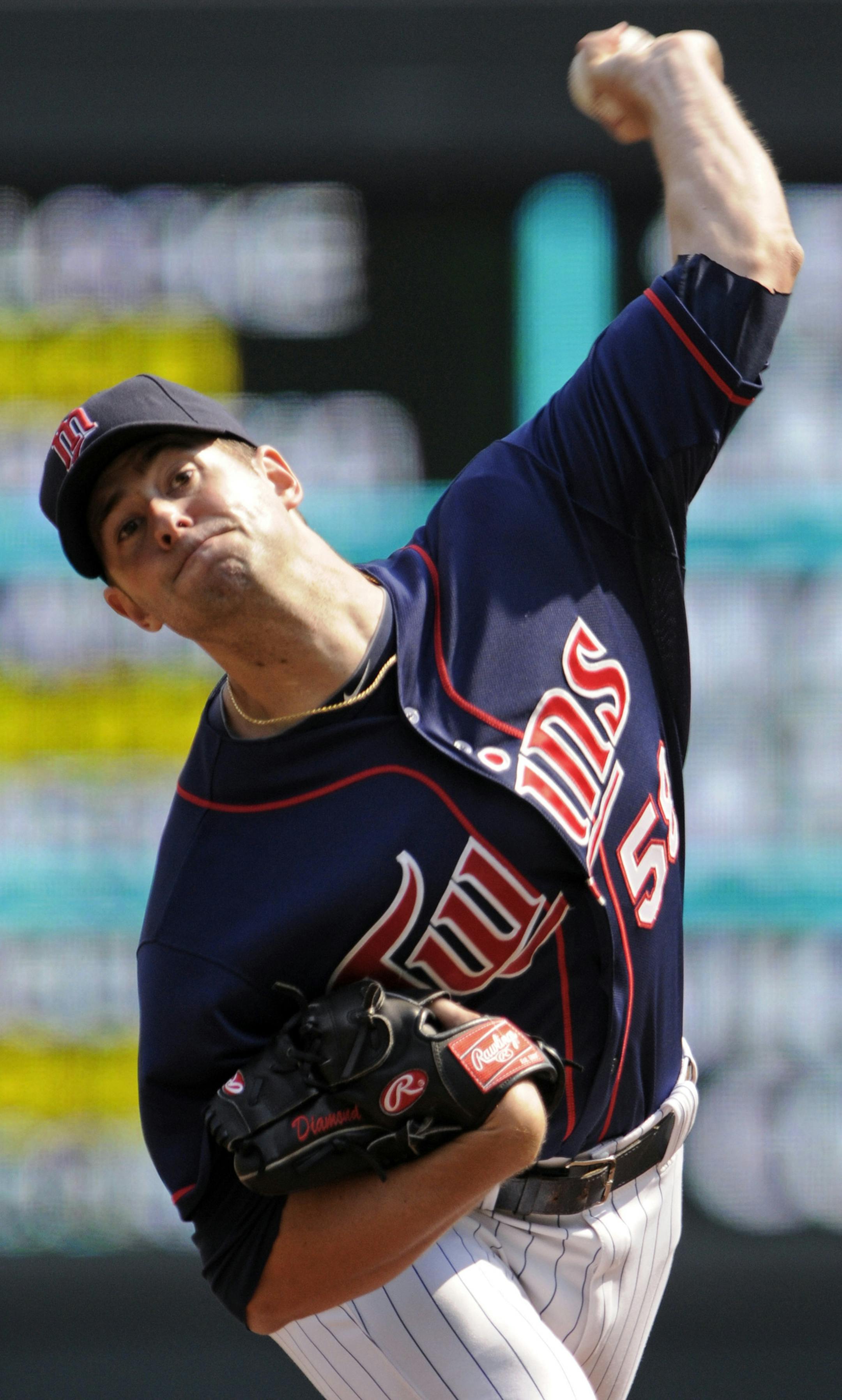 Minnesota Twins pitcher Scott Diamond throws against the Kansas City Royals during a baseball game, Sunday, Sept. 16, 2012, in Minneapolis. (AP Photo/Jim Mone) ORG XMIT: MIN2012091615191653