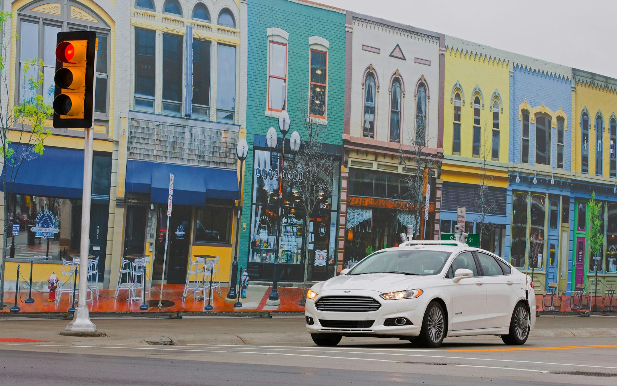 Ford is accelerating testing of its Fusion Hybrid Research Vehicle as the first automaker to test a fully autonomous vehicle at Mcity, the world's first full-scale simulated urban environment at University of Michigan. (Ford Motor Company) ORG XMIT: 1179859
