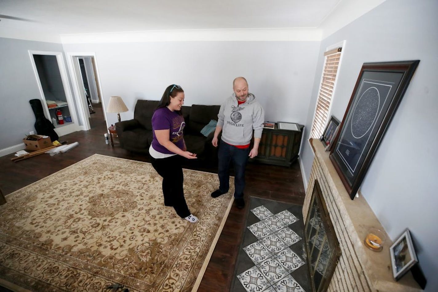 Paul Teeter and Anna Case looked at the tile work in their new 2,100 square-foot, three-bedroom home Wednesday Feb 21, 2018 in Richfield, MN.