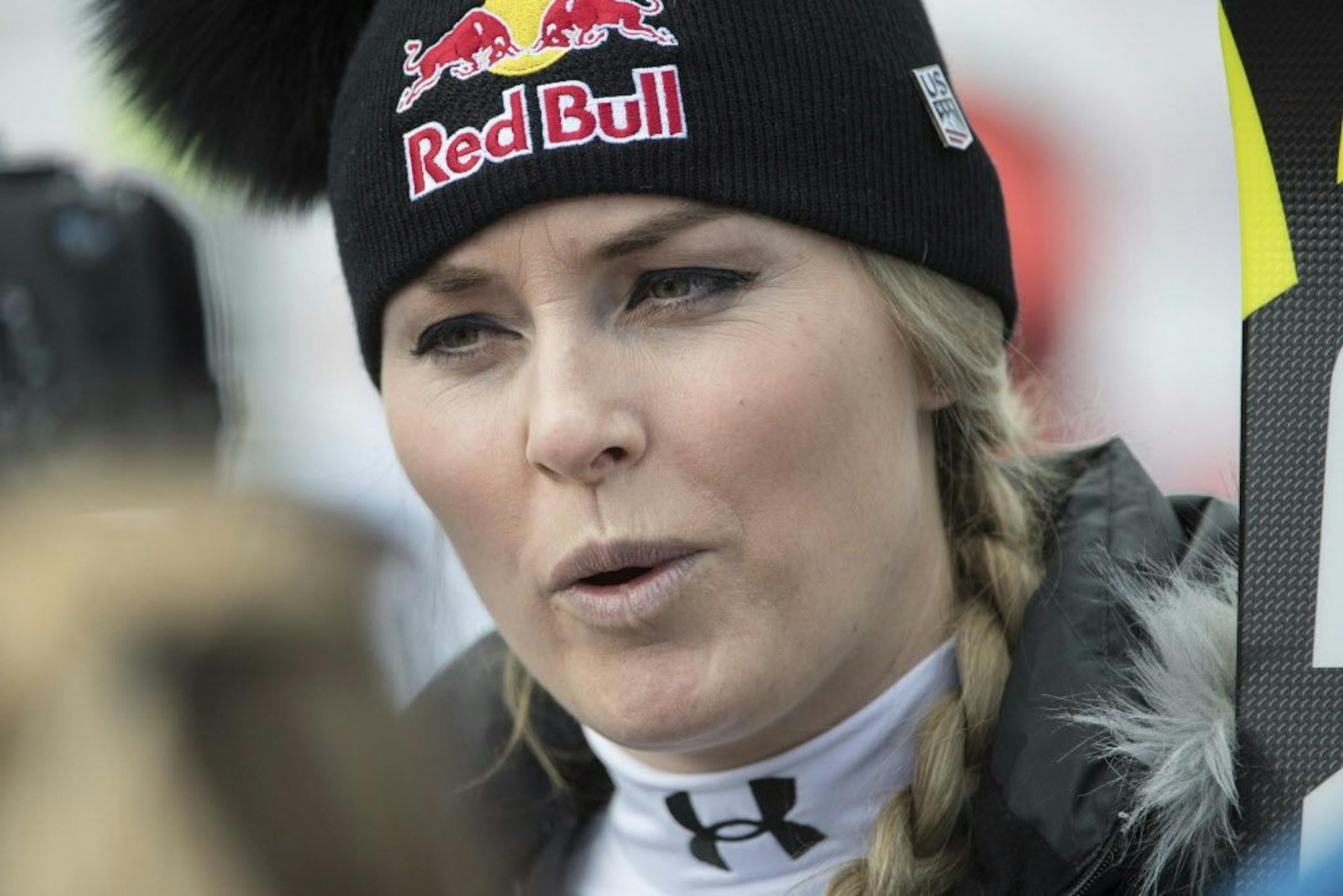 Lindsey Vonn of the United States, who refused the start, talks to reporters in the finish area during the women's alpine combined Super-G race of the Alpine Skiing World Cup, in Crans-Montana, Switzerland, Friday, Feb. 24, 2017.