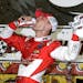 Kevin Harvick celebrates in Victory Lane after winning the NASCAR Sprint Cup series auto race at Darlington Raceway in Darlington, S.C., Saturday, Apr