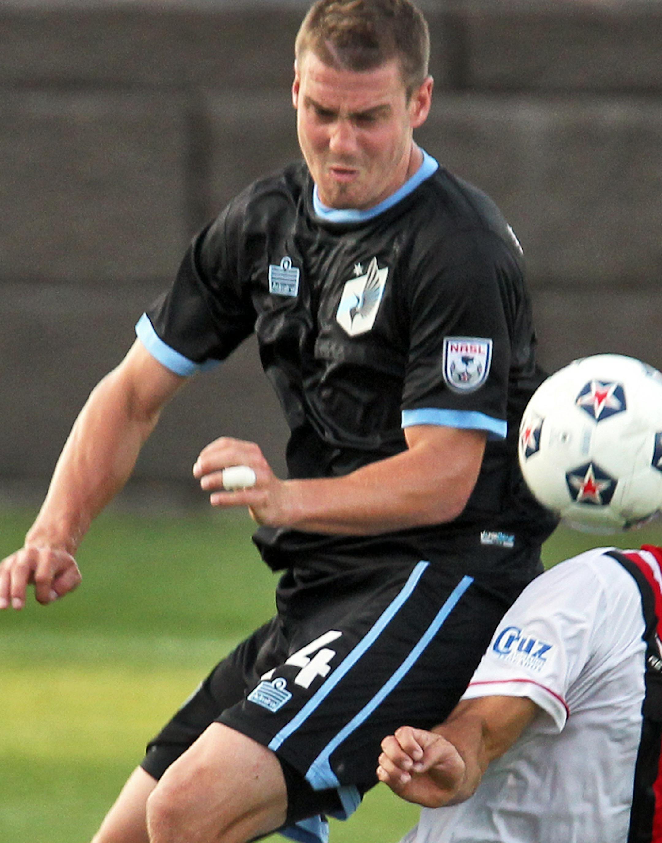 United vs. Atlanta professional soccer. United's Brian Kallman, left, and Atlanta's Brad Stisser fought for control of the ball. (MARLIN LEVISON/STARTRIBUNE(mlevison@startribune.com ORG XMIT: MIN1307042110072024