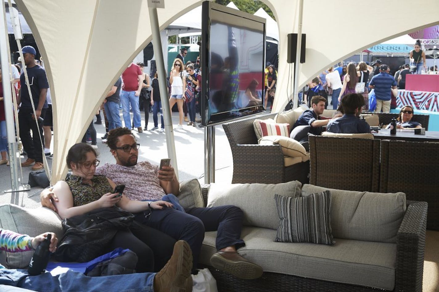 Festival goers experience the "Pandora Back Yard" tech event on March 16 in Austin, Texas during the 2017 South by Southwest music festival.