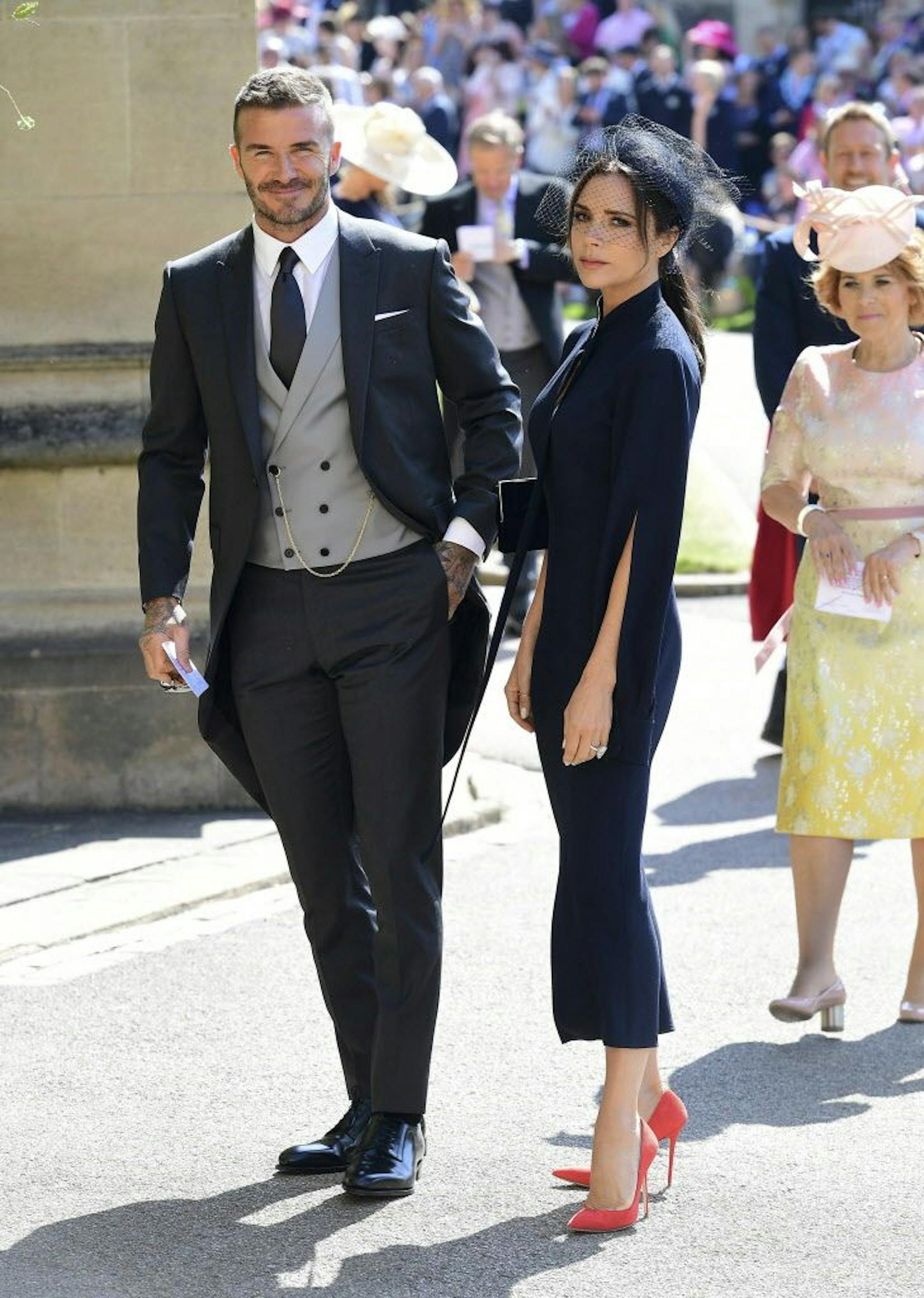 David and Victoria Beckham arrive for the wedding ceremony of Prince Harry and Meghan Markle at St. George's Chapel in Windsor Castle in Windsor, near London, England, Saturday, May 19, 2018.