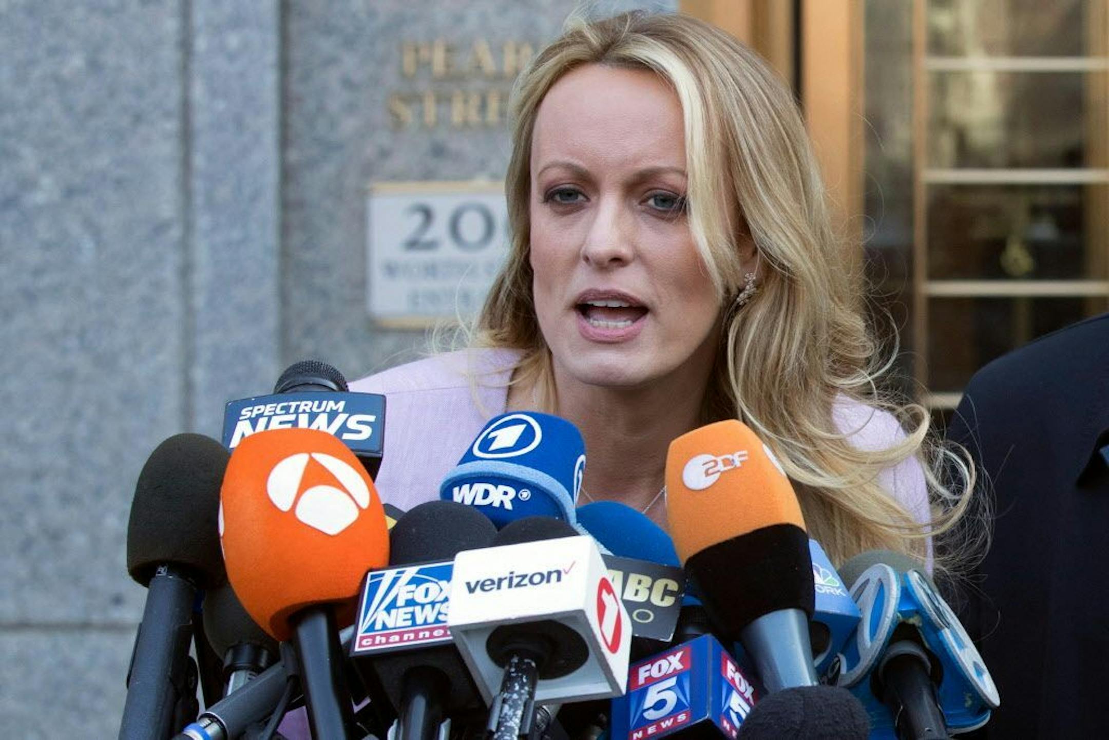 FILE - In this April 16, 2018, file photo, adult film actress Stormy Daniels speaks outside federal court in New York.