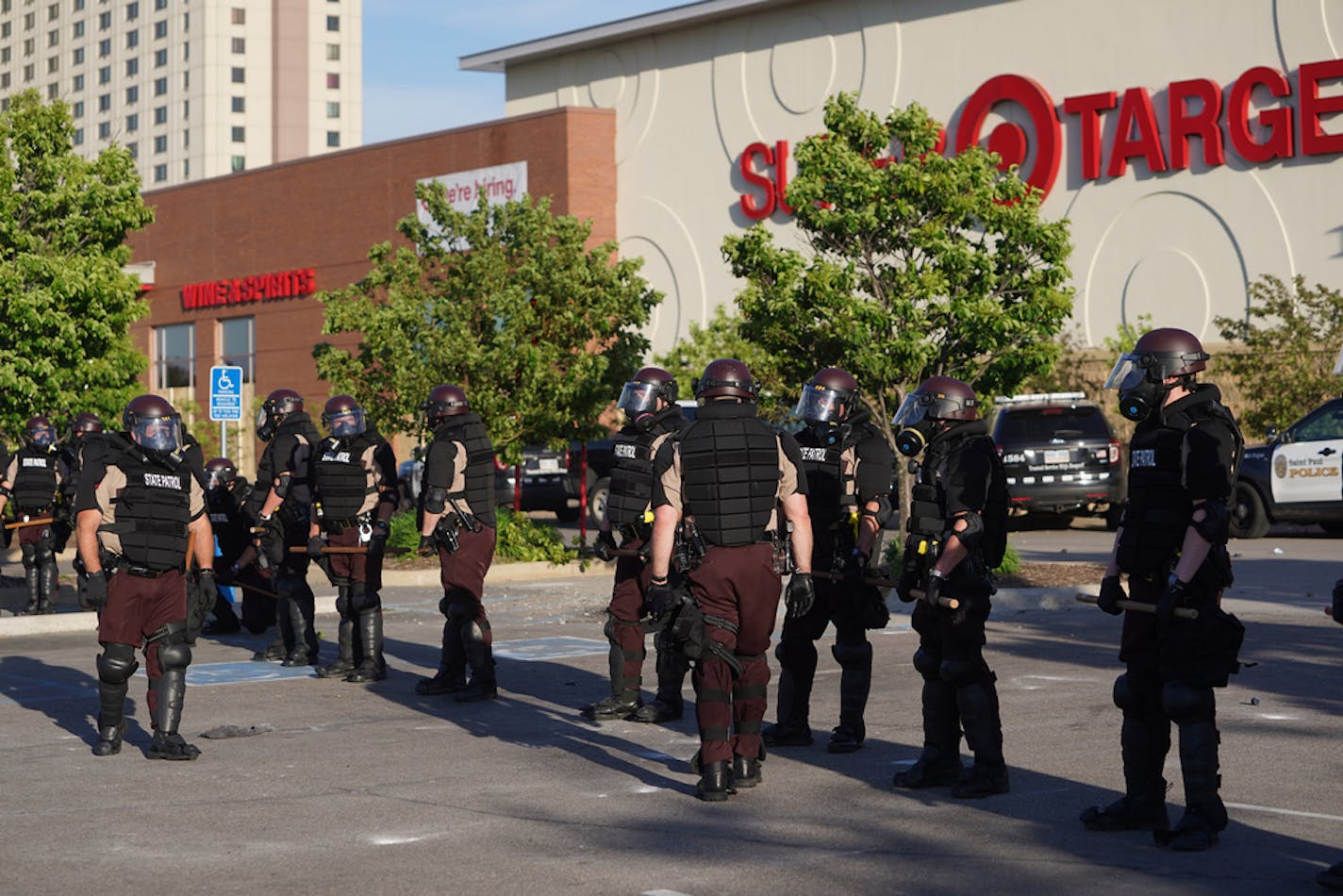 Police secured the St. Paul Midway Target after people began looting late Thursday morning.