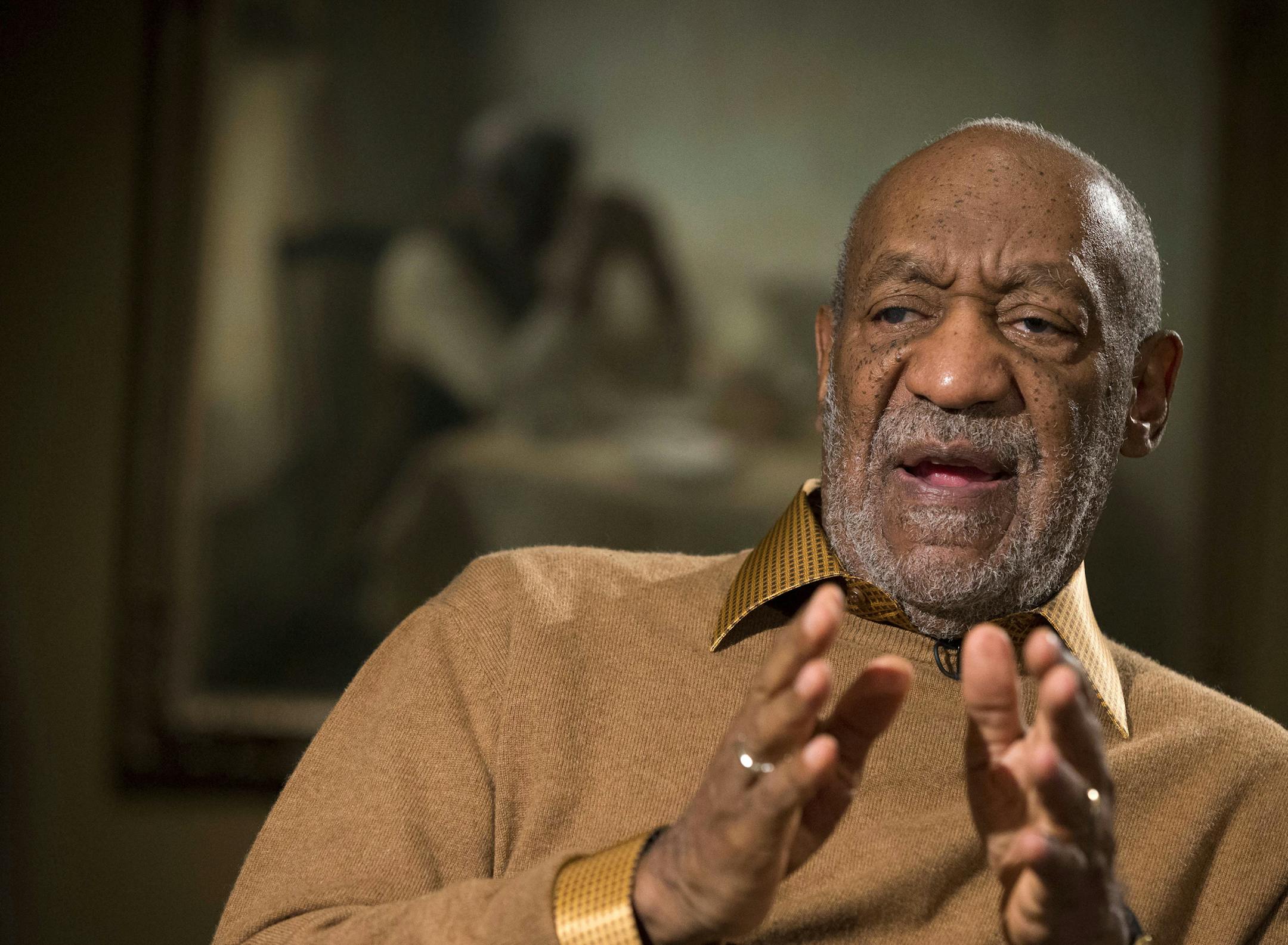 In this Nov. 6, 2014 file photo, entertainer Bill Cosby gestures during an interview at the Smithsonian's National Museum of African Art in Washington.