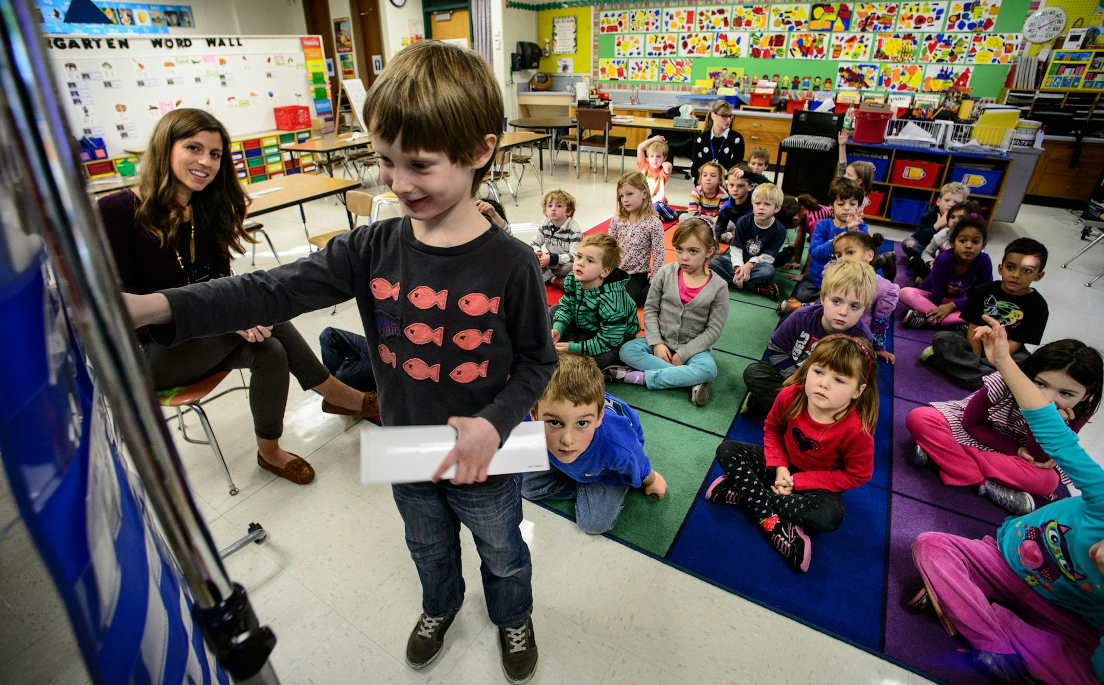 Kintergartener Ryder Ganes built a sentence of vocabulary words and pictures in Kristin Koloski's all-day Kindergarten class at Meadowbrook Elementary in Golden Valley. Friday, November 15, 2013. ] GLEN STUBBE * gstubbe@startribune.com