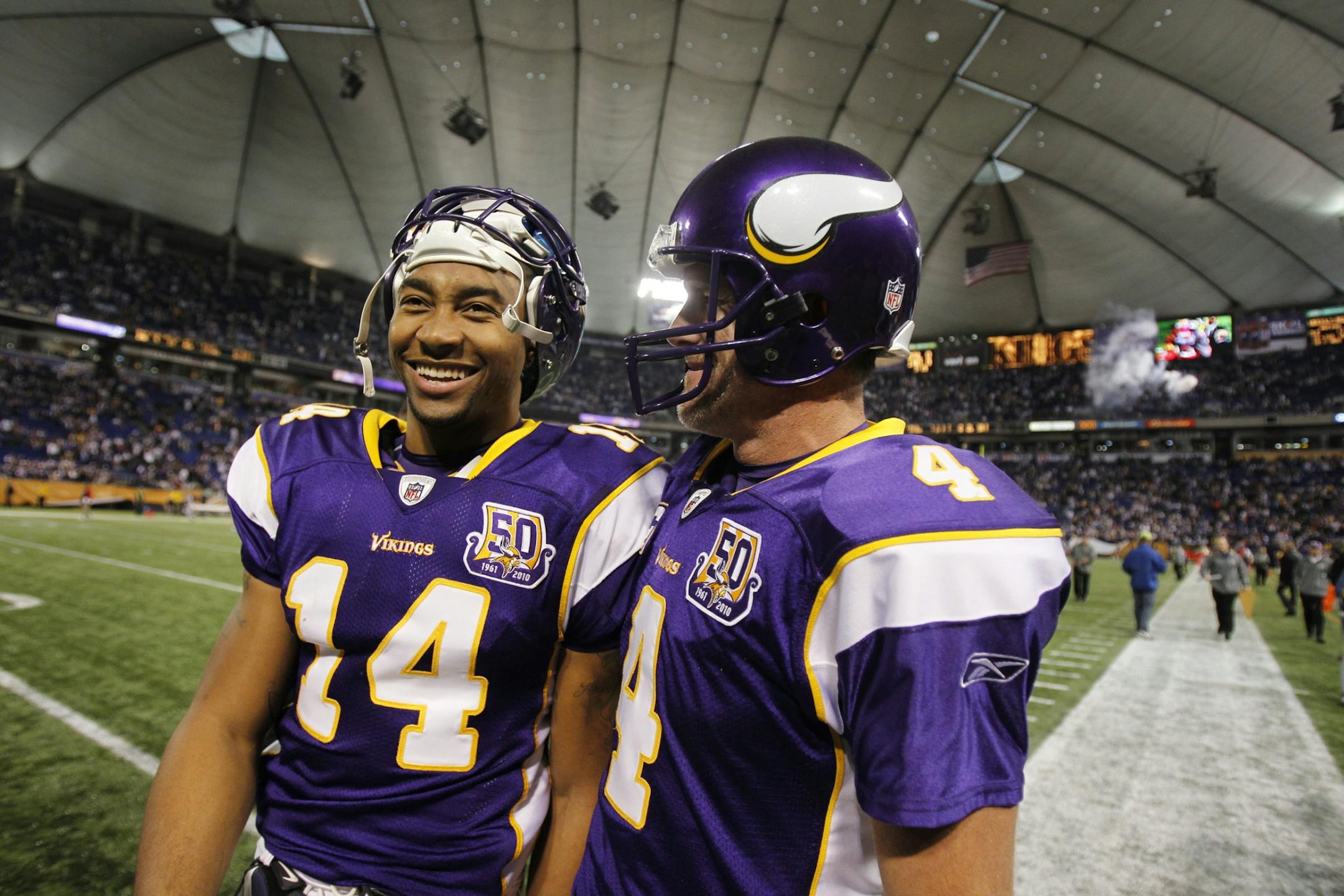 Vikings quarterbacks Joe Webb and Brett Favre walked off the field after the Vikings beat Buffalo 38-14.