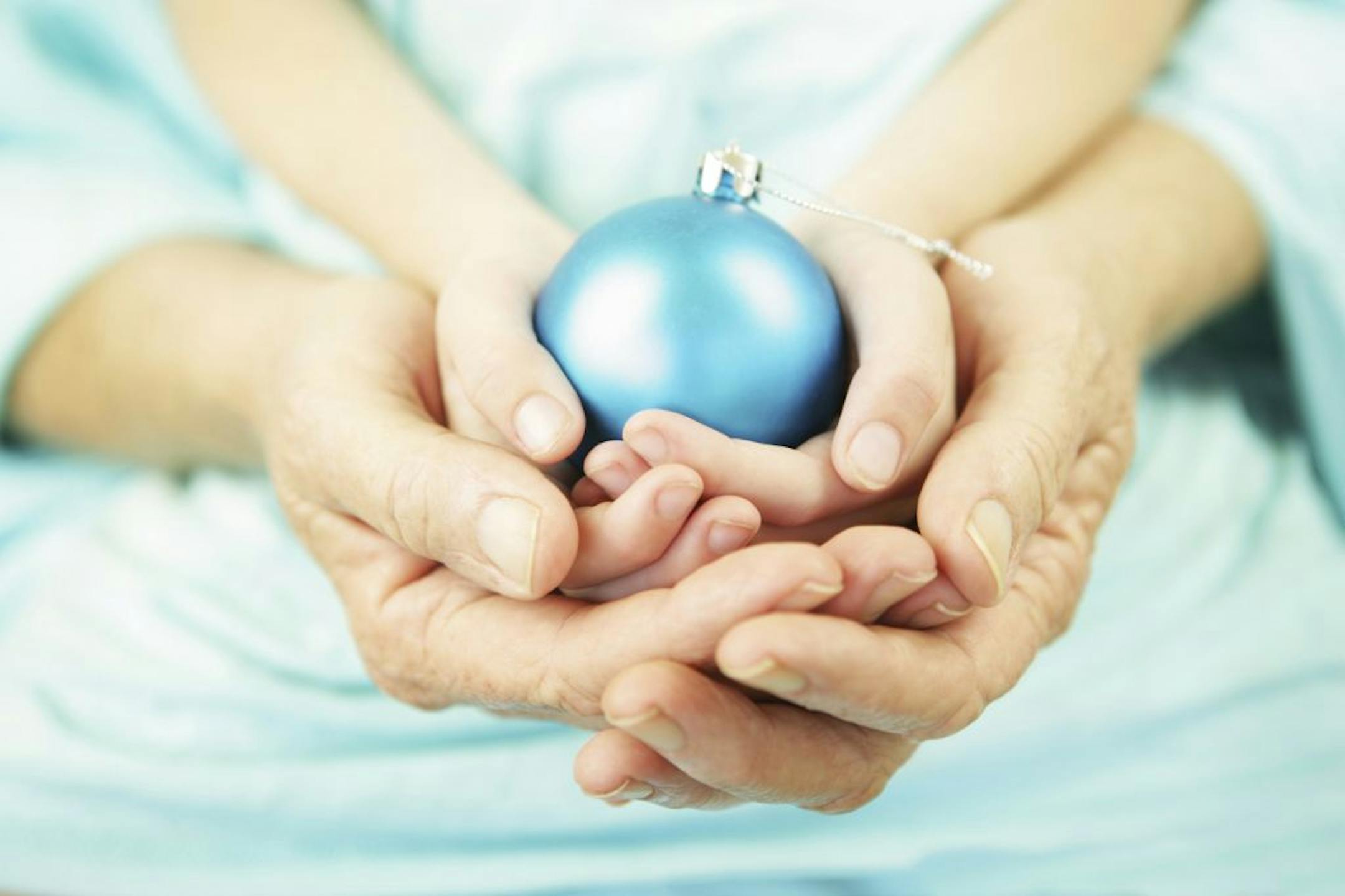 credit: Tamara Murray, iStock grandma, grandparent, child, Christmas, holiday, ornament