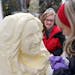 This year's Princess Kay of the Milky Way Rebekka Paskewitz smiled and chilled as artist Linda Christensen carved her bust in butter.