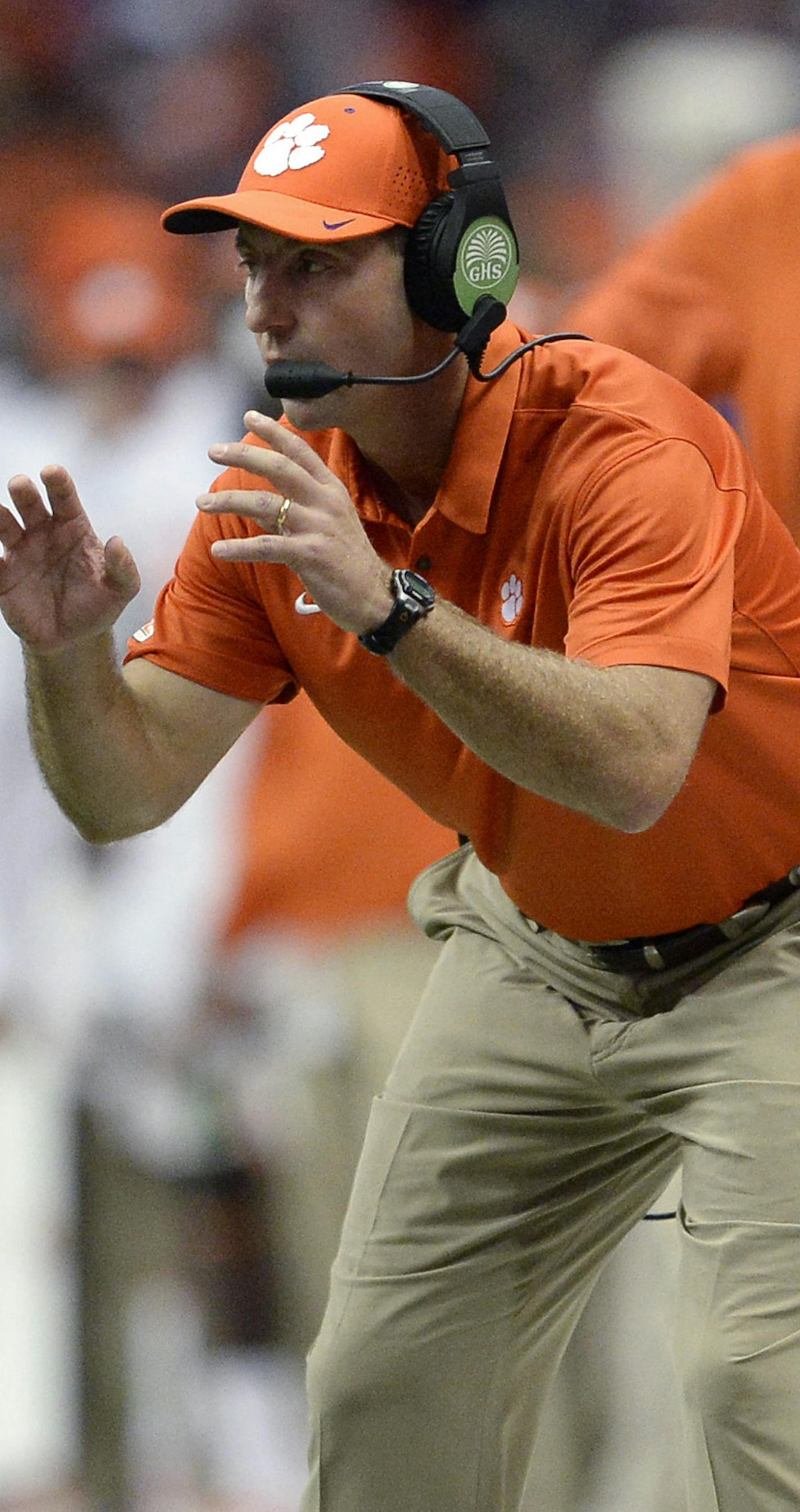 Clemson coach Dabo Swinney watches from the sideline during the second half of the team's NCAA college football game against Syracuse, Friday, Oct. 13, 2017, in Syracuse, N.Y. Syracuse upset No. 2 Clemson, 27-24. (AP Photo/Adrian Kraus) ORG XMIT: MIN2017102616065437