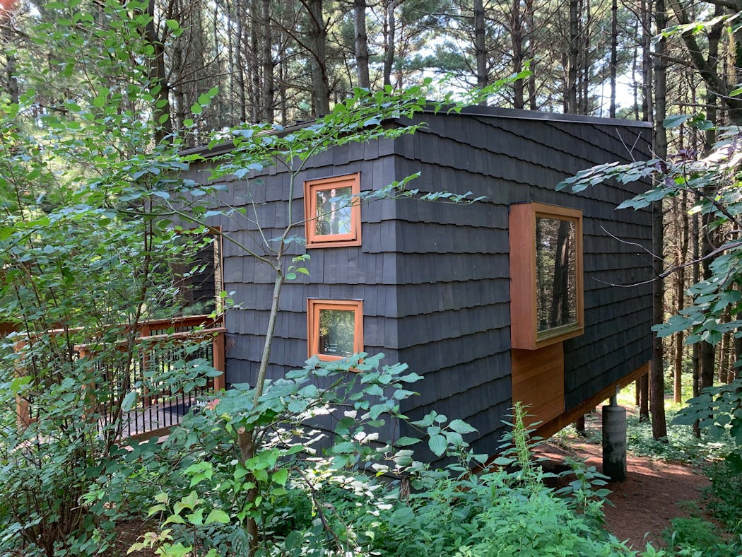 The Pine Forest camper cabins are cantilevered into the trees.