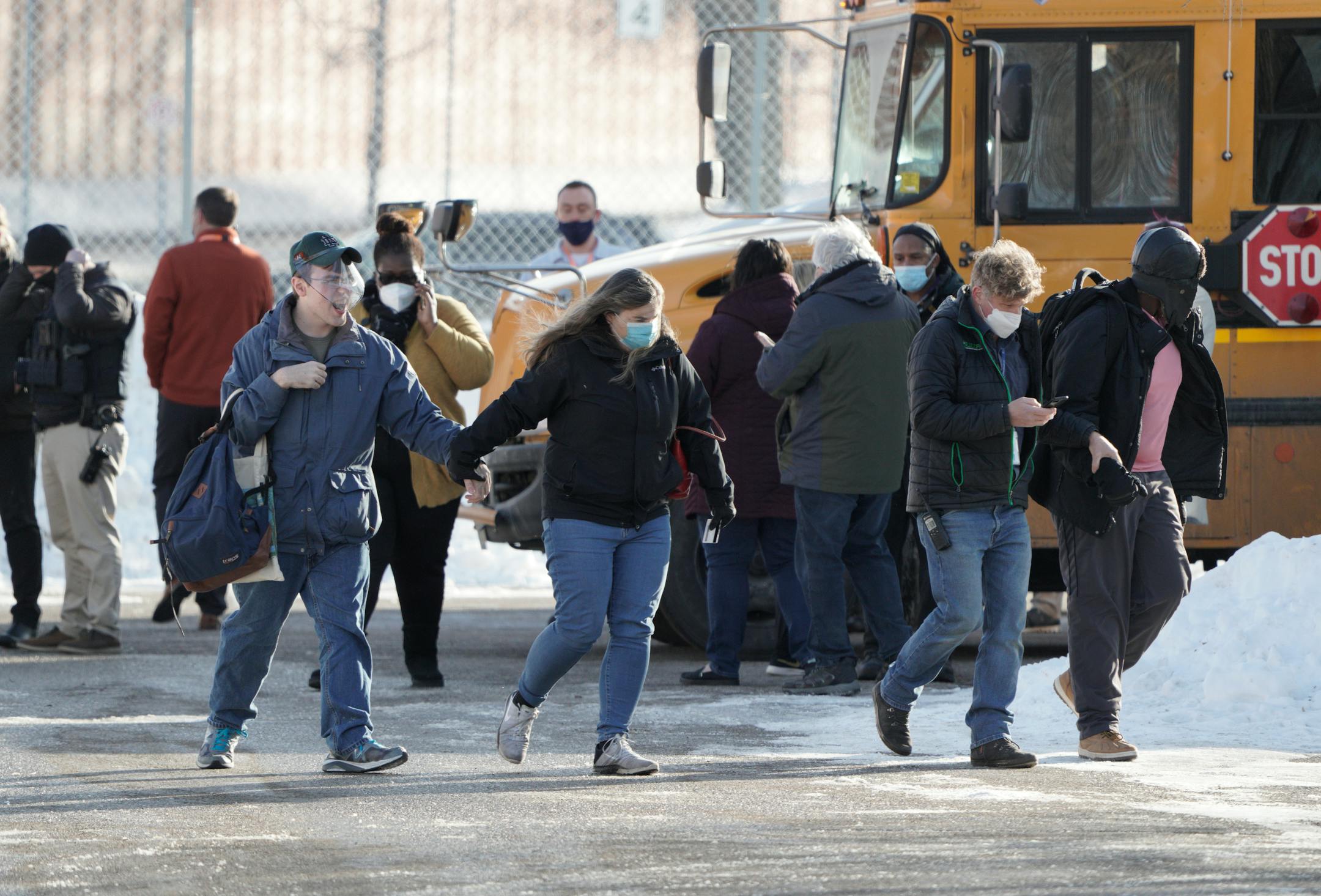 One student was shot and killed, and another severely wounded on the sidewalk outside the South Education Center, an alternative school in the Intermediate District 287 that serves students from pre-K to age 21. Here, students reunite with parents and caregivers after the school was locked down for a few hours Tuesday, Feb. 1, 2022 in Richfield, Minn. ] Brian Peterson ¥ brian.peterson@startribune.com