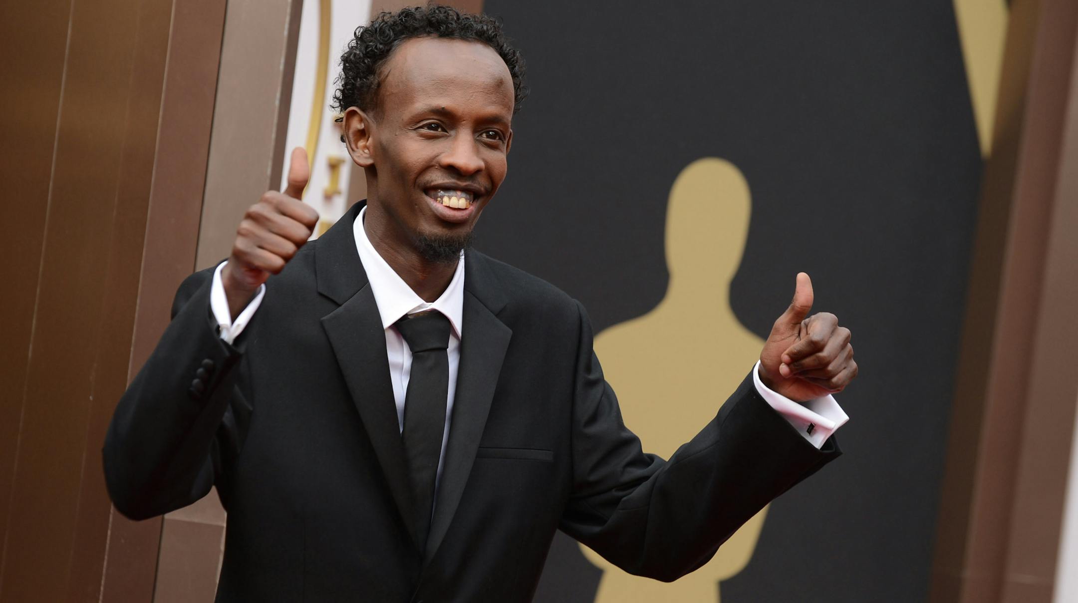Barkhad Abdi arrives at the Oscars on Sunday, March 2, 2014, at the Dolby Theatre in Los Angeles.