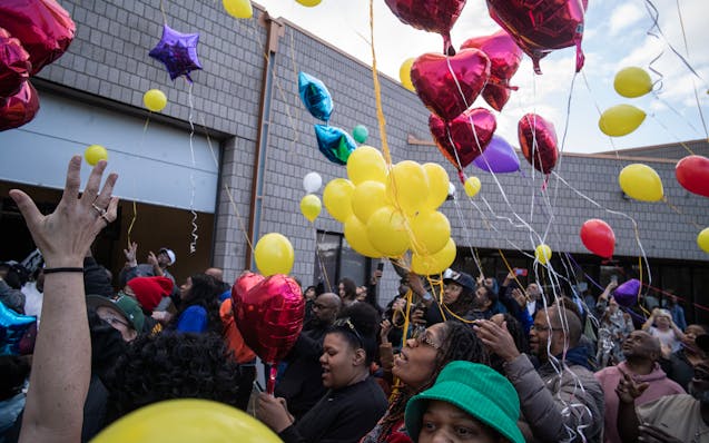 Friends and family of Sammy McDowell, including sister Shaawn-Dai McDowell, in the green hat, celebrated his life during a picnic and balloon release 