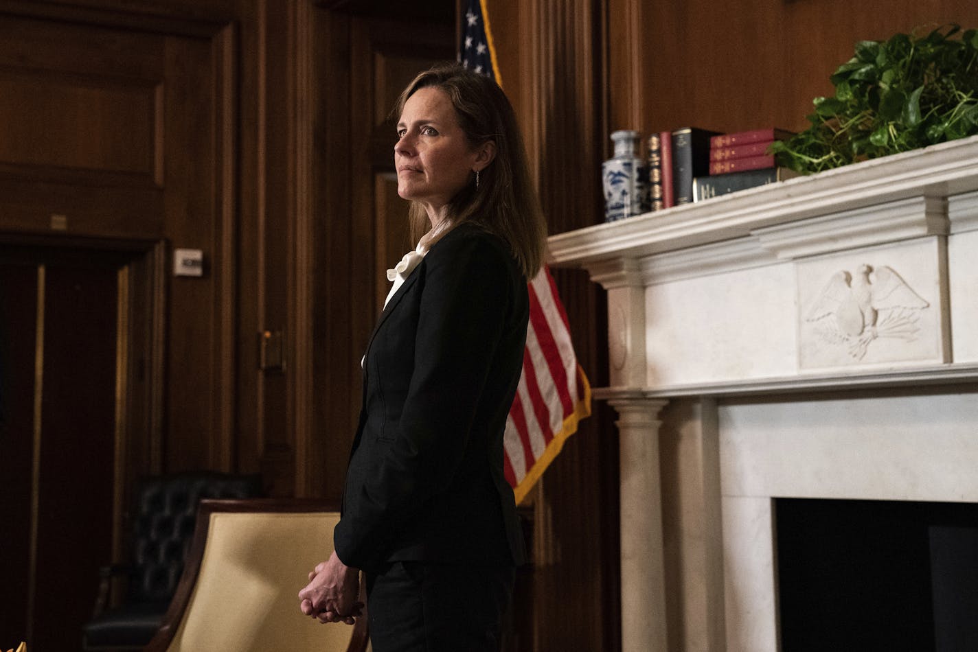 Supreme Court nominee Judge Amy Coney Barrett, meets Sen. Jerry Moran, R-Kan., not shown, on Capitol Hill, Thursday, Oct. 1, 2020, in Washington. (Anna Moneymaker/The New York Times via AP, Pool)