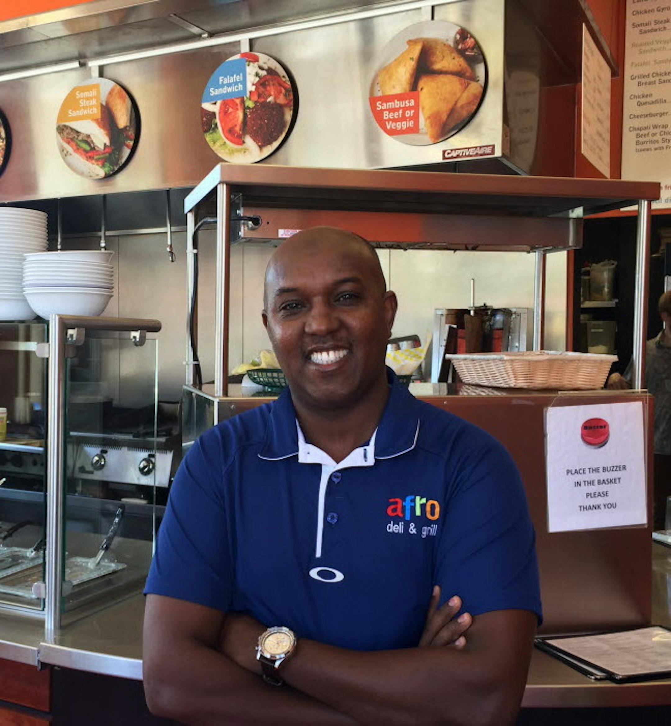 Abdirahman Kahin, owner of six-year-old Afro Deli n the African Development Center on the West Bank. Photo: Neal.St.Anthony@startribun
