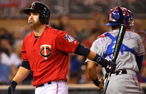 Minnesota Twins second baseman Brian Dozier (2) reacts after striking out swinging in the bottom of the 9th inning Friday night. ] (AARON LAVINSKY/STA