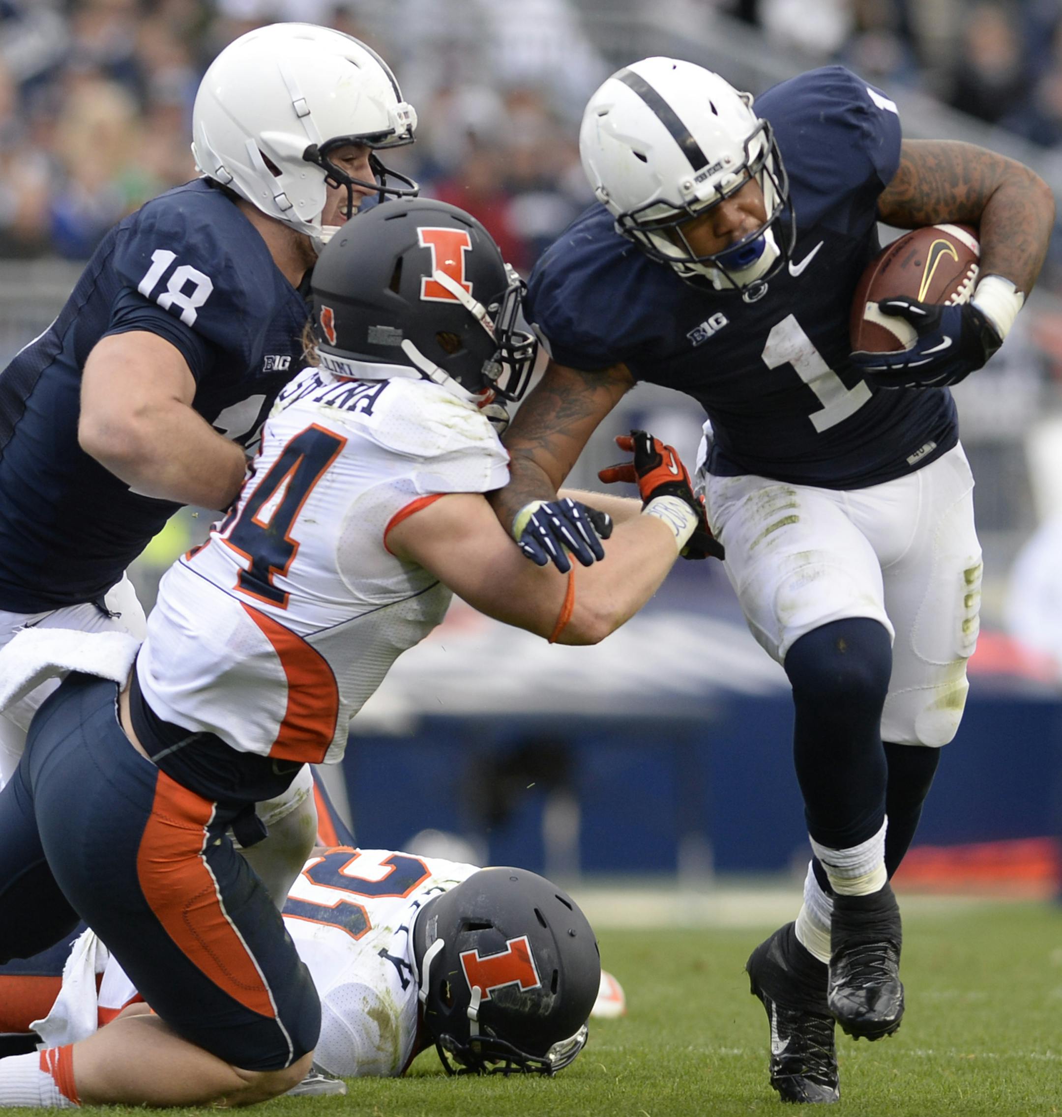 Penn State's Bill Belton (1) eludes a tackle attempt by Illinois linebacker Mike Svetina (34) during an NCAA college football game in State College, Pa., Saturday, Nov. 2, 2013. At left is Penn State tight end Jesse James (18). (AP Photo/John Beale)
