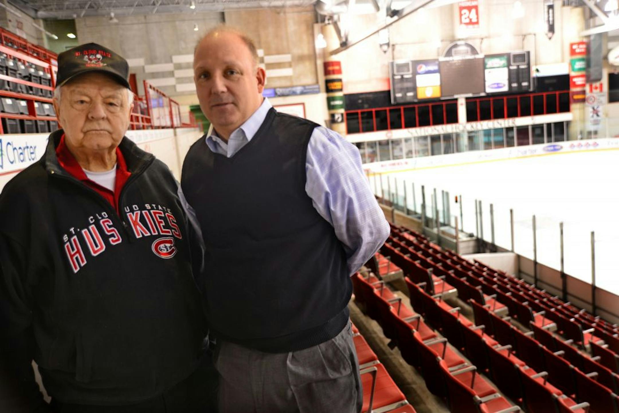 Charlie Basch was a long-serving SCS hockey coach and coached games outdoors and current coach Bob Motzko got together before looking over the new addition to the rink on the St Cloud campus.