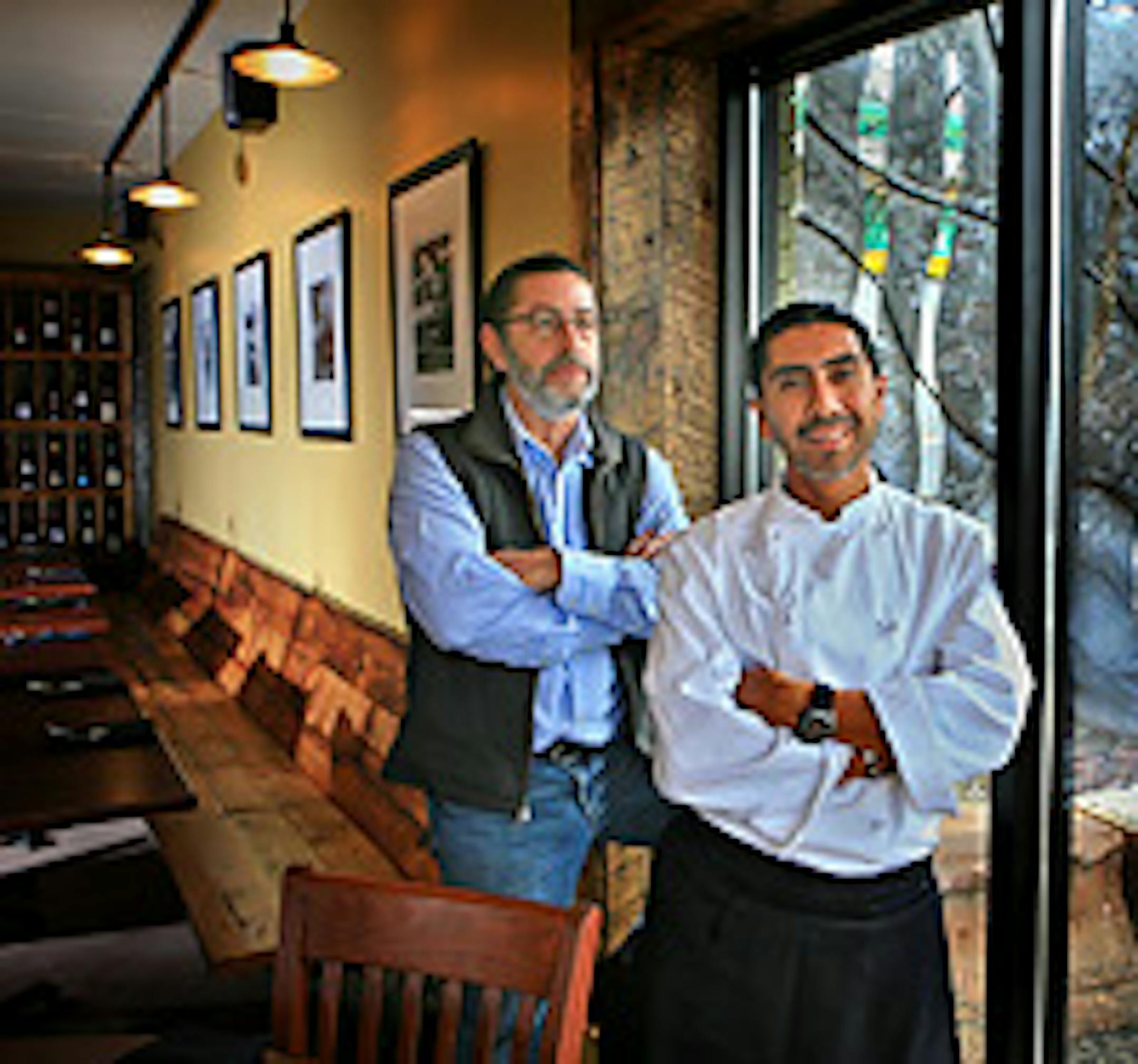 Dave Kopfmann, left, and chef/co-owner Juan Juarez Garcia stand in their La Chaya Bistro on Nicollet Av. S.