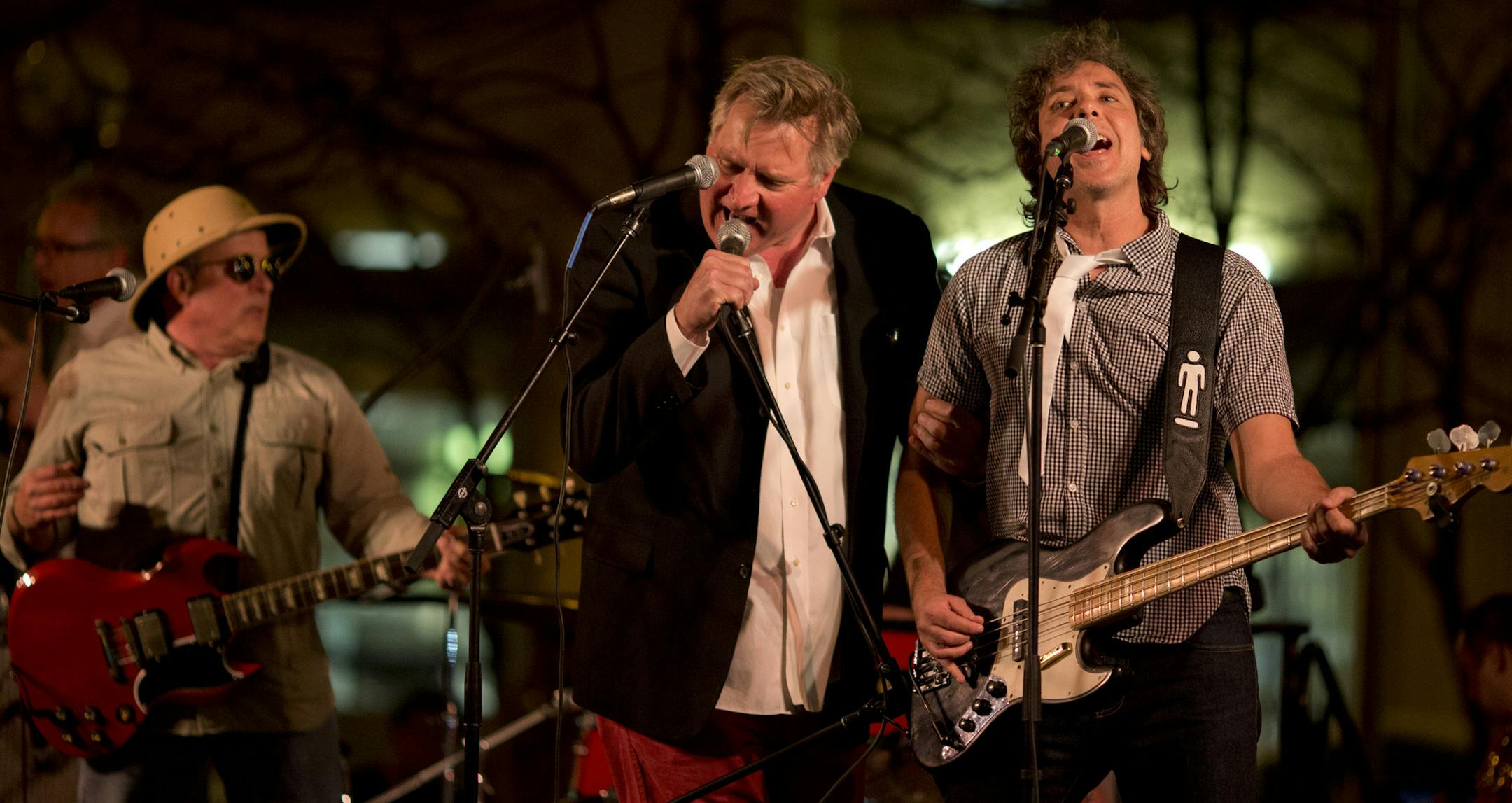 The City of St. Paul hosted a "Love is the Law" outdoor musical celebration Tuesday evening, May 14, 2013 to commemorate the signing of the historic marriage bill. The party culminated in the appearance by The Suburbs, whose song, "Love is the Law" became the anthem of the same-sex marriage movement in the state. Chan Poling and bassist Steve Price joined in on the chorus for "Love is the Law" Tuesday night. At left is Chris Osgood. ] JEFF WHEELER ‚Ä¢ jeff.wheeler@startribune.co