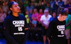 Lynx forward Maya Moore, left, and guard Lindsay Whalen observed a moment of silence in honor of Philando Castile before tipoff of Saturday's game aga
