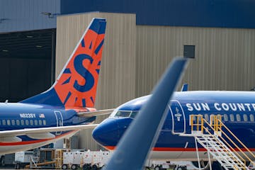 Image of Sun Country jets on the tarmac at Minneapolis-St Paul International Airport at the airline's maintenance facility.