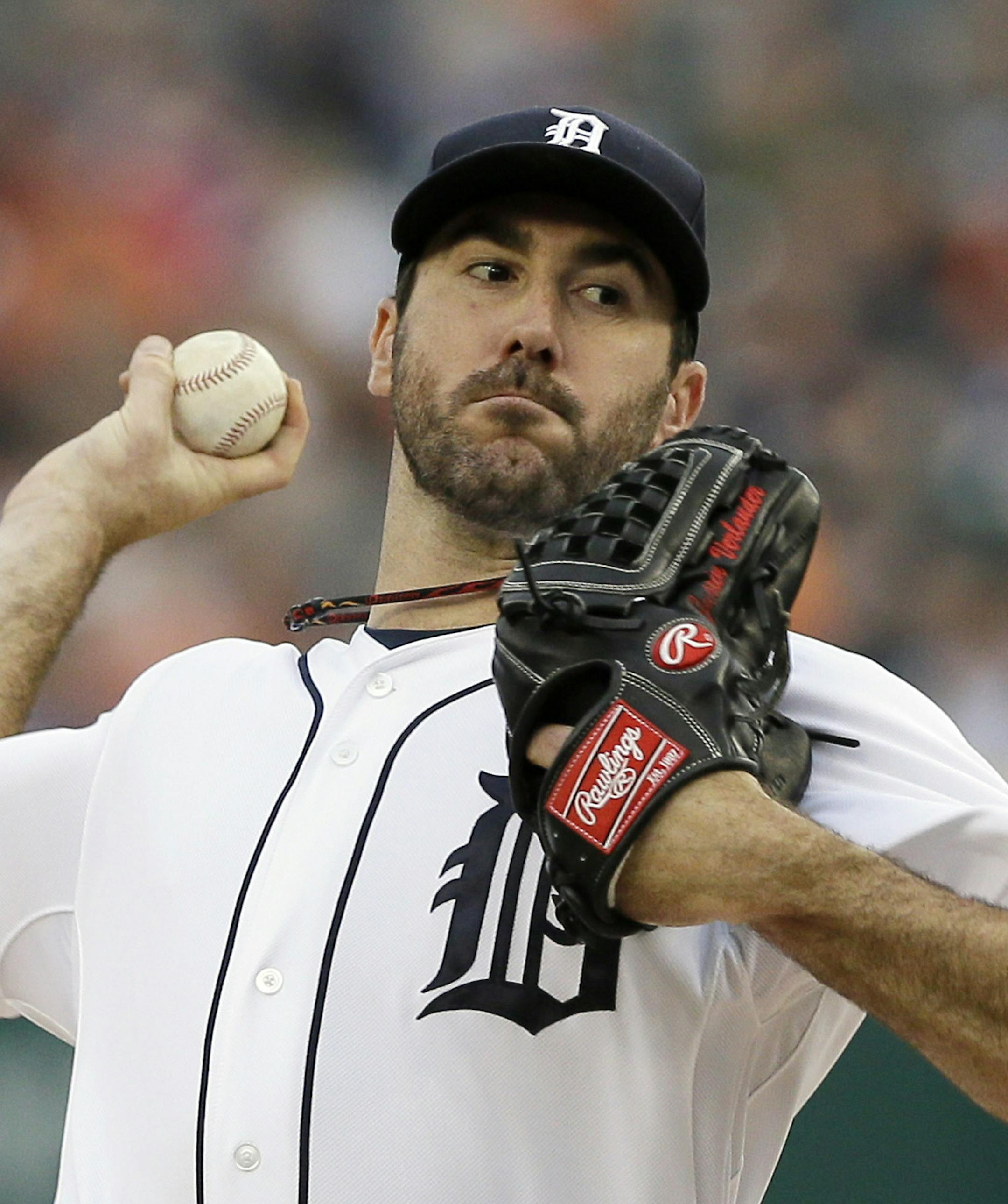 Detroit Tigers starting pitcher Justin Verlander throws during the first inning of a baseball game against the Minnesota Twins in Detroit, Friday, May 9, 2014. (AP Photo/Carlos Osorio)