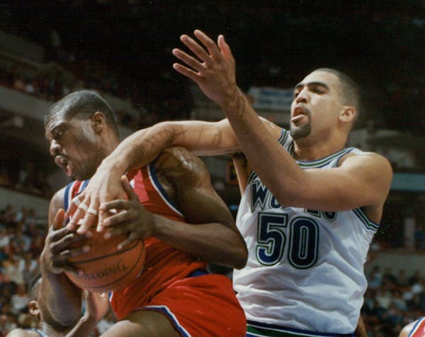 January 5, 1991 Timberwolves center Felton Spencer fouled Washington's Bernard King as he went up for a shot in the first half Friday night. January 4