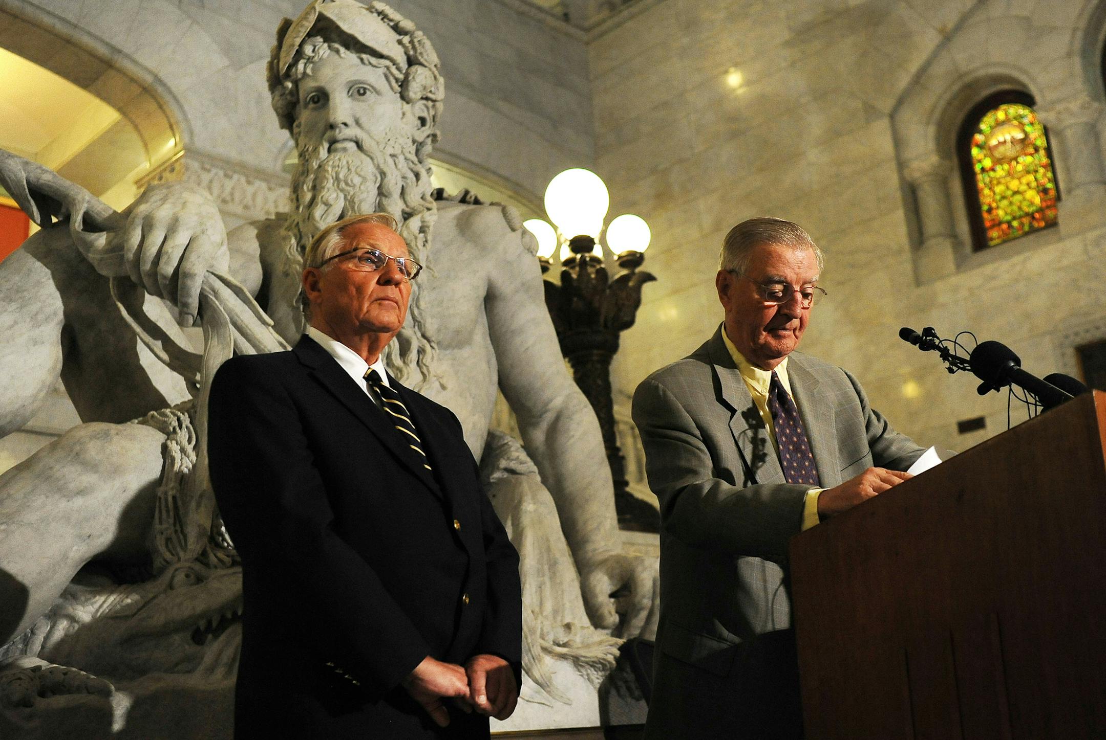 Former Minnesota Gov. Arne Carlson, left, and former Vice President Walter Mondale listen to questions during a news conference on Tuesday, July 5, 2011 in Minneapolis. Mondale and Carlson announced an independent commission designed to resolve Minnesota's budget deadlock. Carlson and Mondale won't serve on the panel. They say it will be co-chaired by Republican former state Sen. Stephen Dille and Democratic former state Rep. Wayne Simoneau. The commission will also include Gov. Mark Dayton's bu