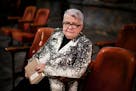 Playwright Paula Vogel on the set of her play "Indecent" at the Guthrie. She is holding a script of Sholem AschÕs ÒGod of Vengeance" A 1923 play tha