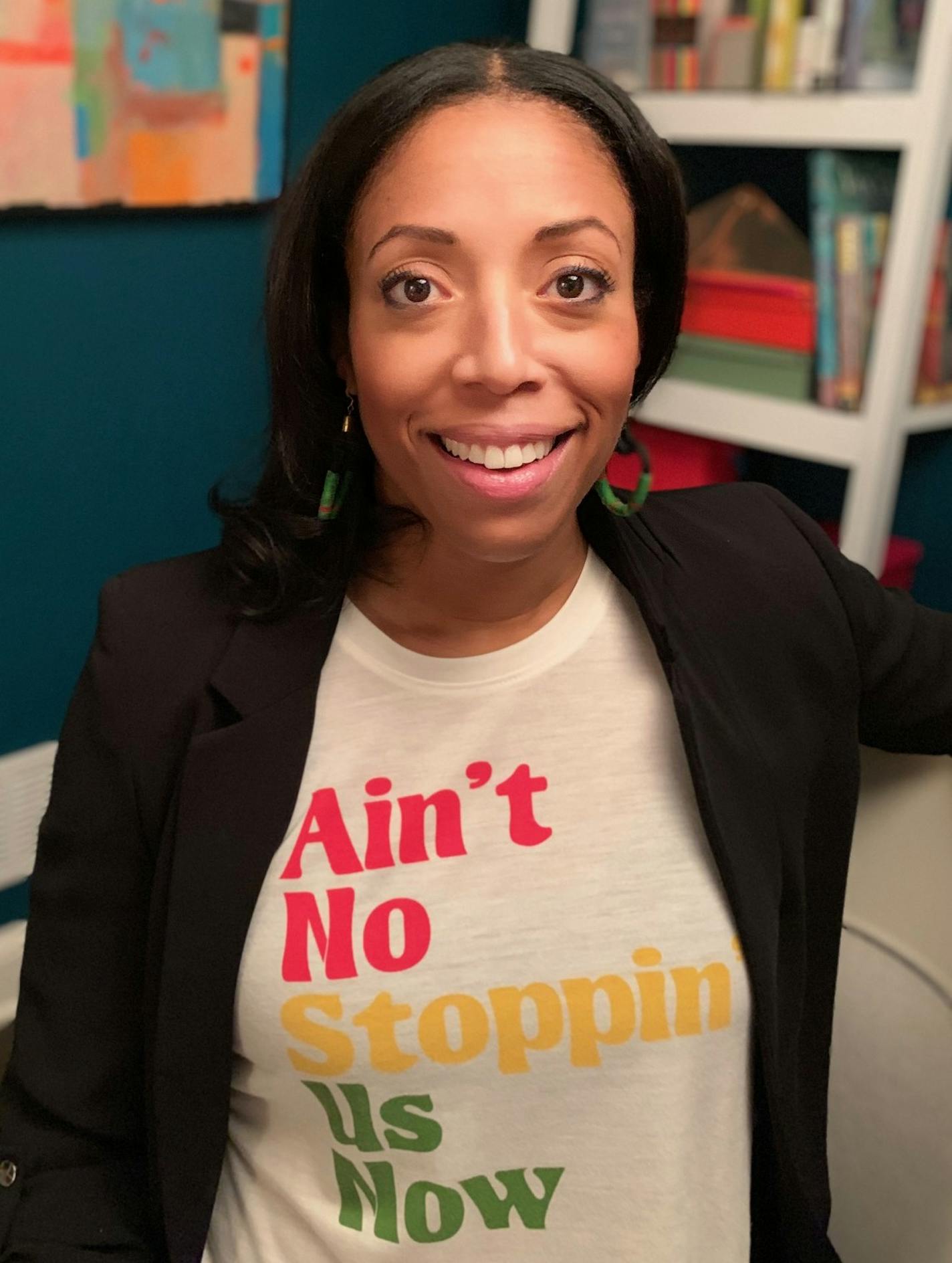 Tawnya Artisst, a product design and development director at Target Corp. She led the business initiatives pillar for the retailer's African American Business Council, which drove the effort to expand Target's Black History Month collection into more than 700 stores this year, triple last year. She is wearing a t-shirt from the 2019 collection. (Photo: Target Corp.)