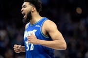 Karl Anthony-Towns (32) of the Minnesota Timberwolves reacts after a play in the first quarter.