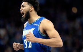 Karl Anthony-Towns (32) of the Minnesota Timberwolves reacts after a play in the first quarter.