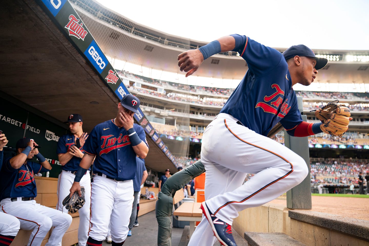 Minnesota Twins second baseman Jorge Polanco (11) runs onto the field as the game against the Chicago White Sox starts Friday, July 15, 2022 at Target Field in Minneapolis. ]