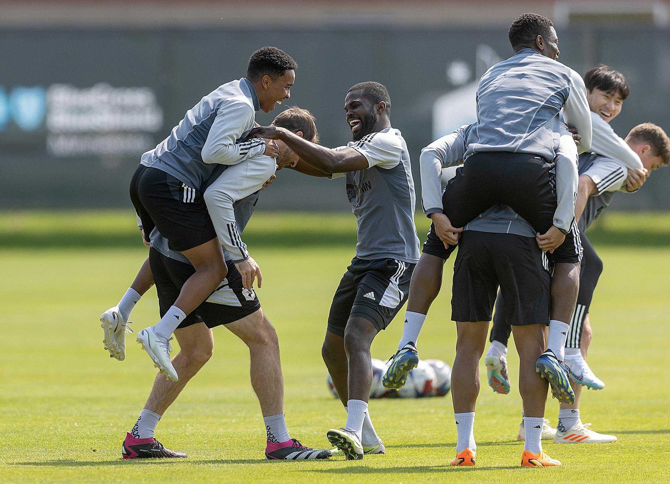 Minnesota United players warm up before a brief practice at the National Sports Center in Blaine, Minn., on Thursday, May 25, 2023.