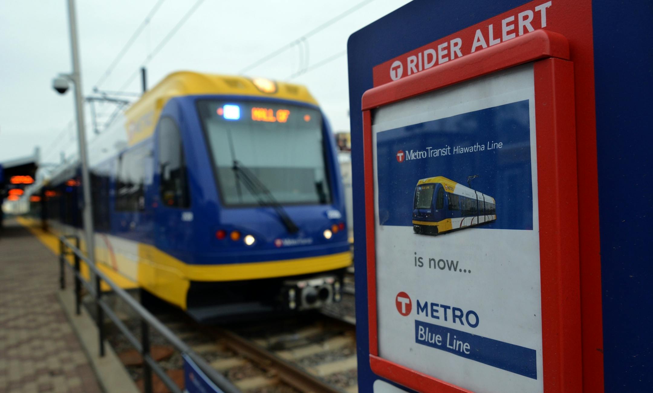 The Hiawatha Light Rail Line is being rebranded as the METRO Blue Line. The Blue Line is the first of the Twin Cities METRO system of rapid transit lines which include METRO Red Line Bus Rapid Transit on Cedar Ave. METRO Blue Line trains will now have three cars and will run every ten minutes throughout most of the day. Twelve new light-rail vehicles dedicated to the line will allow this increased service capacity. During the kickoff event Metro Transit staff handed out Blue line pens, new sched
