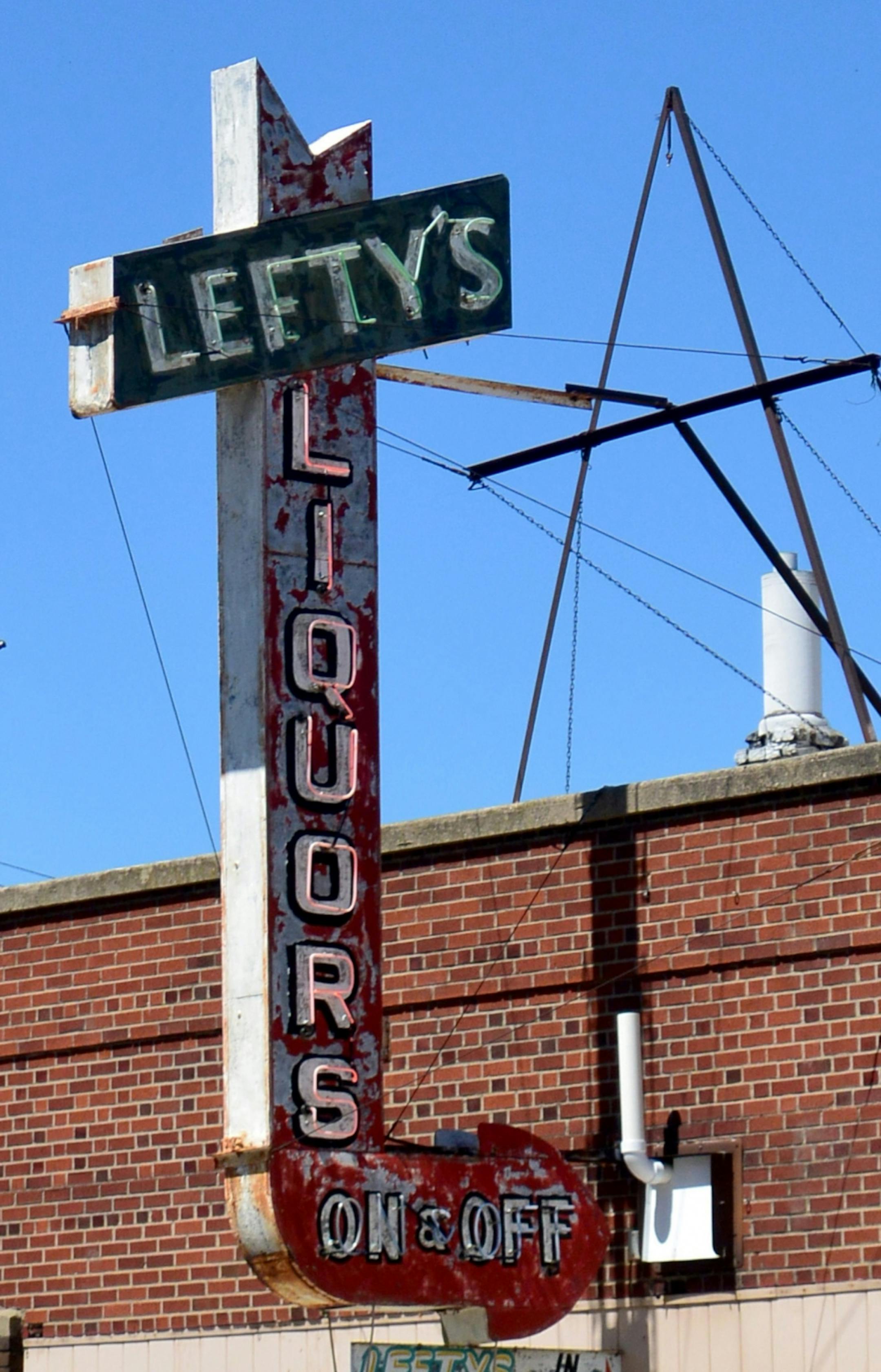 Lefty's Liquors -- a piece of old signage on old Highway 10 in Staples. Their Facebook page says they have "pickled gizzards."