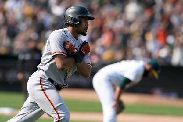 LaMonte Wade Jr. is hitting home runs for the Giants after not being seen as a power hitter when he was with the Twins.