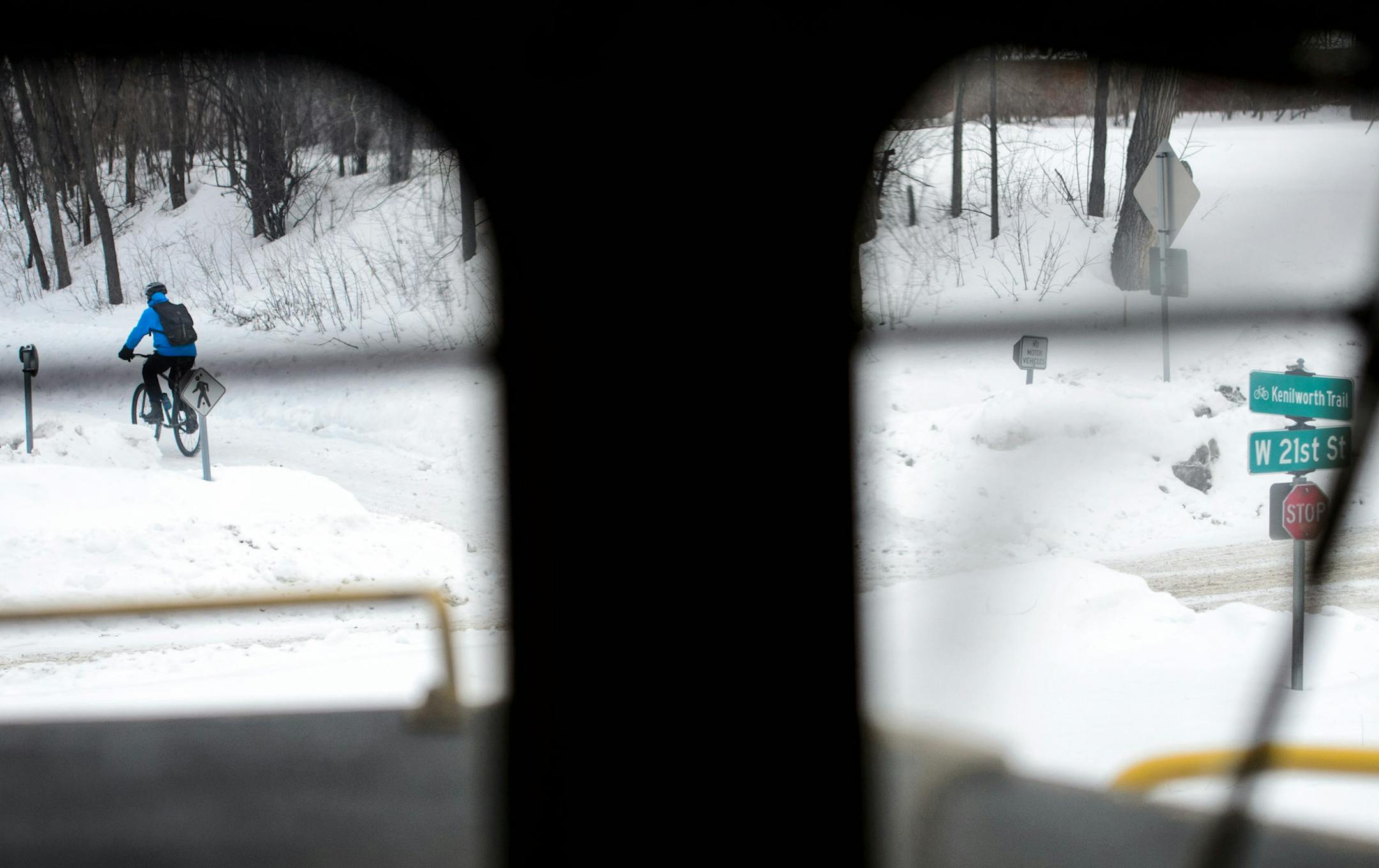 9:04 a.m. The train crossed W 21st St in Calhoun Isles neighborhood of Minneapolis, paralleling the Kenilworth Trail. ] GLEN STUBBE * gstubbe@startribune.com Tuesday March 4, 2014. It's the small railroad that has caused big headaches for planners of the Southwest Corridor light rail. The Twin Cities & Western hauls corn, soybeans and ethanol from rural Minnesota to St. Paul, and is leery about moving its line to make room for the future light rail. We ride along on the little railroad with over
