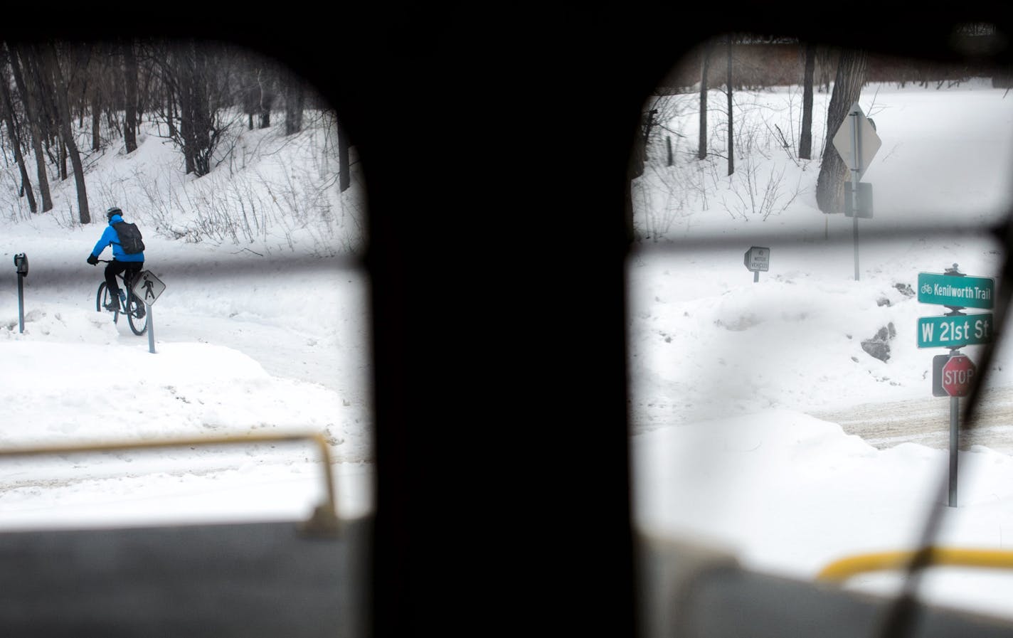 9:04 a.m. The train crossed W 21st St in Calhoun Isles neighborhood of Minneapolis, paralleling the Kenilworth Trail. ] GLEN STUBBE * gstubbe@startribune.com Tuesday March 4, 2014. It's the small railroad that has caused big headaches for planners of the Southwest Corridor light rail. The Twin Cities & Western hauls corn, soybeans and ethanol from rural Minnesota to St. Paul, and is leery about moving its line to make room for the future light rail. We ride along on the little railroad with over