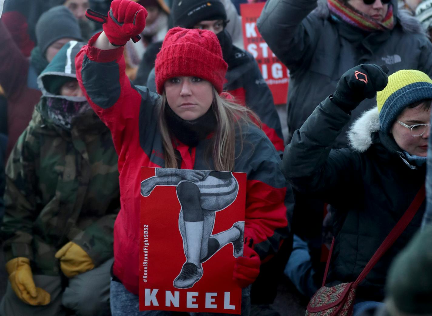 Protesters take a knee outside US Bank at the conclusion of a march outside the Super Bowl Sunday, Feb. 4, 2018, in Minneapolis, MN. ] DAVID JOLES &#xef; david.joles@startribune.com At 3pm, Anti-Racist Anti-Corporate rally at Peavey Park (Chicago and Franklin) and then march toward stadium. At 4pm, Take a Knee Nation participants will hold a rally at 8th and Chicago to protest police violence. Among the participants: Mothers of people killed by police.