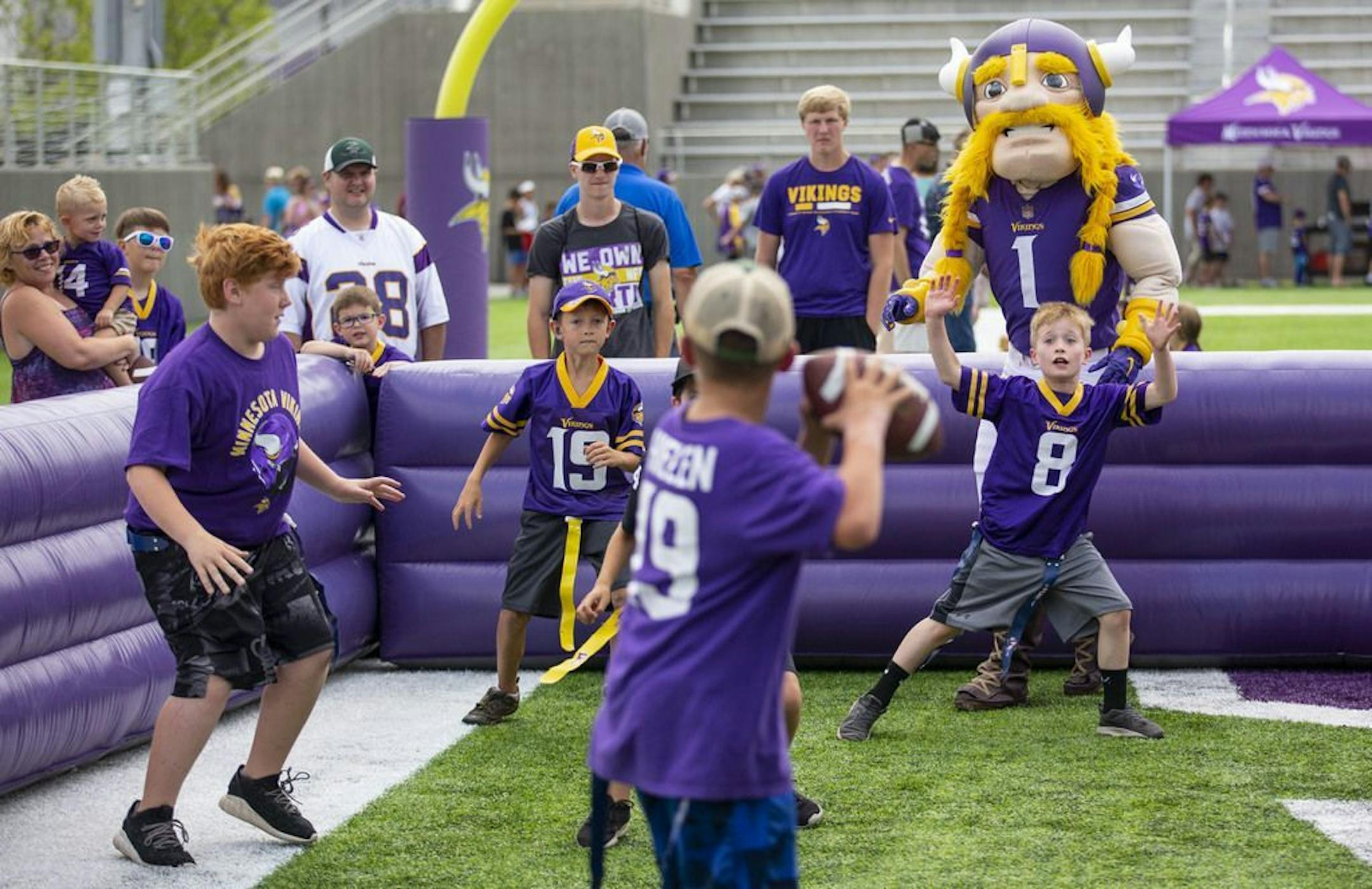 Viktor the Viking, the Minnesota Vikings mascot, participated in a small flag football game with young Vikings fans. ALEX KORMANN • alex.kormann@startribune.com The Minnesota Vikings opened up their first full day of training camp on Friday July 26, 2019 at TCO Performance Center in Eagan, MN. Doors opened to fans at 11AM to watch their favorite players practice and get excited for the 2019 NFL season.